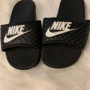Nike Slides I purchased and Never worn too tight.